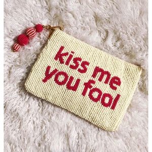kate spade kiss me you fool clutch